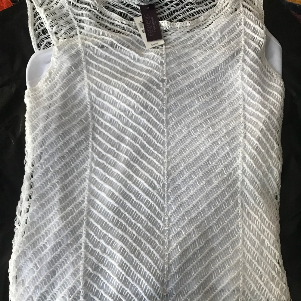 Loose knit sleeveless sweater